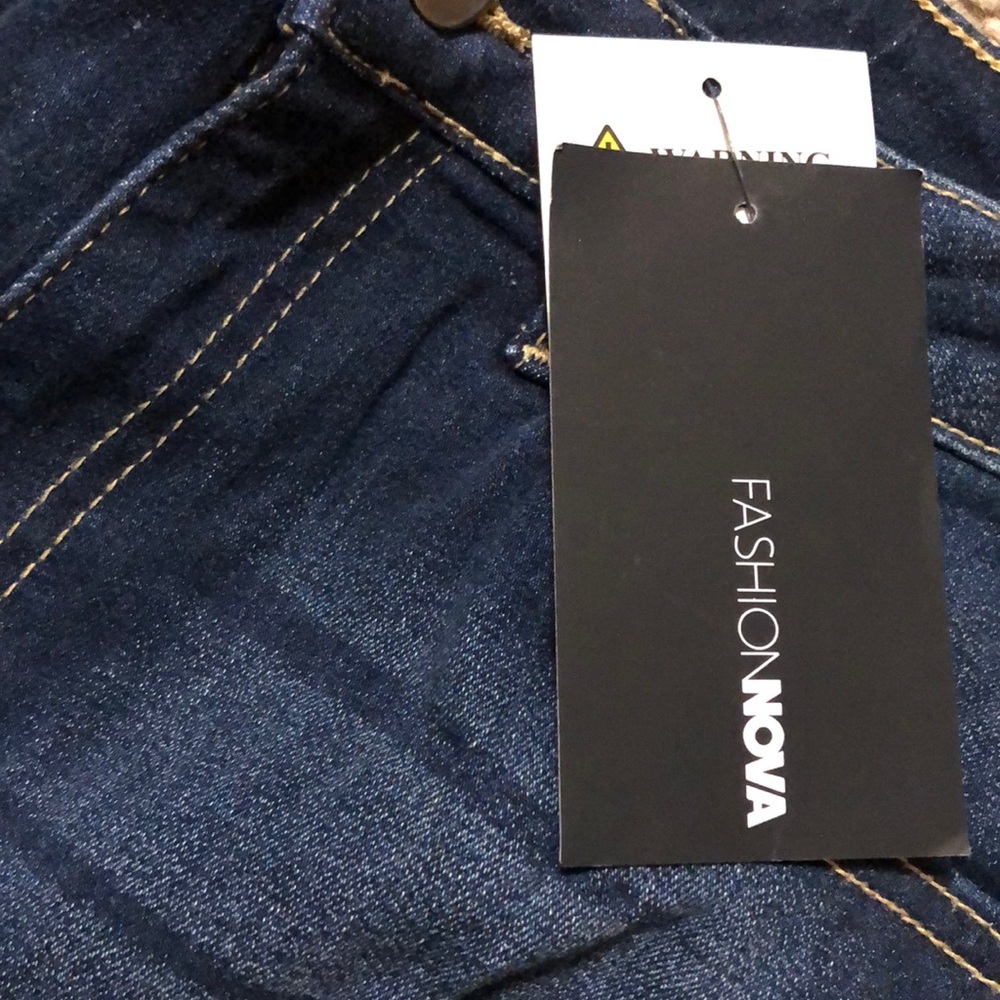 High Rise Distressed Jeans - Picture 4 of 9